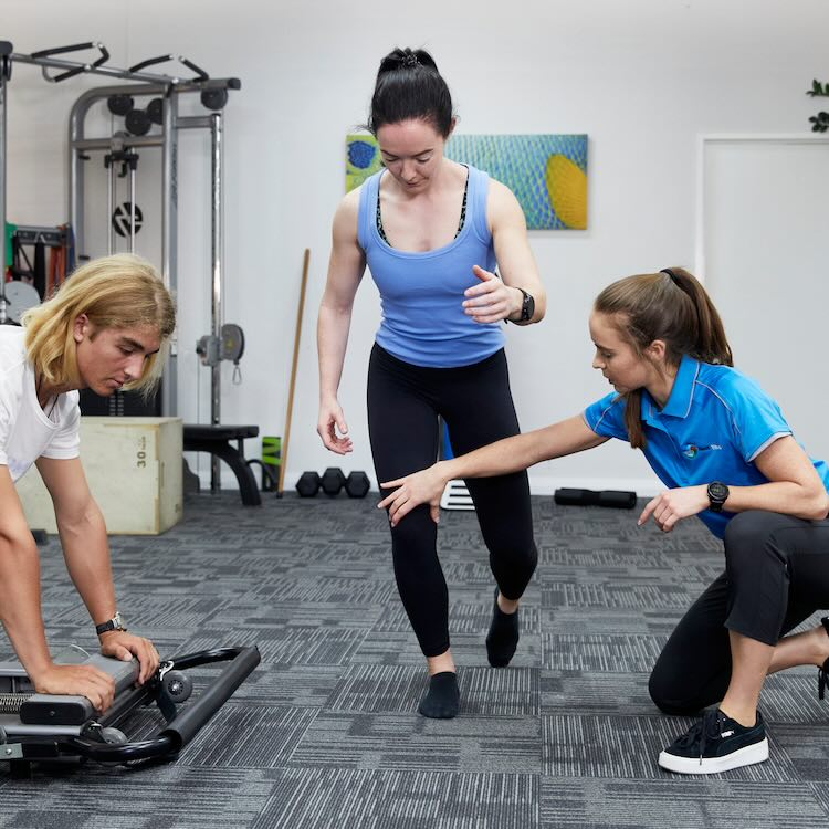 Man and woman doing sports physio in Fremantle